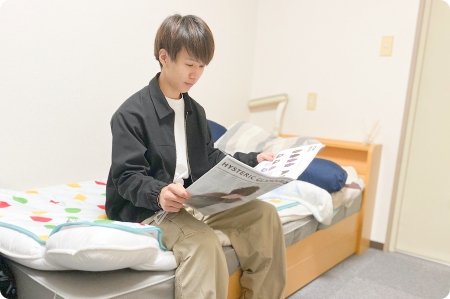 学生寮に住んでいる先輩へインタビューのイメージ